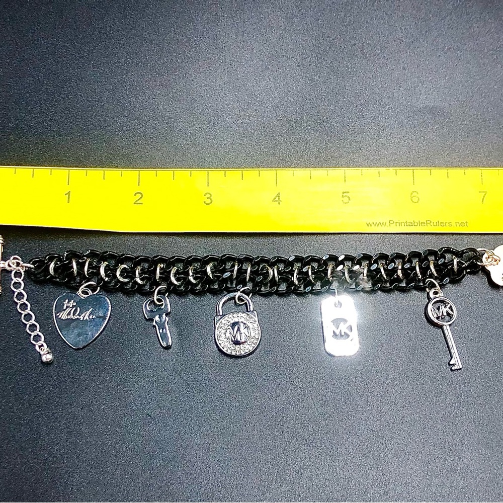Black and Silver Bracelet with Charm Details